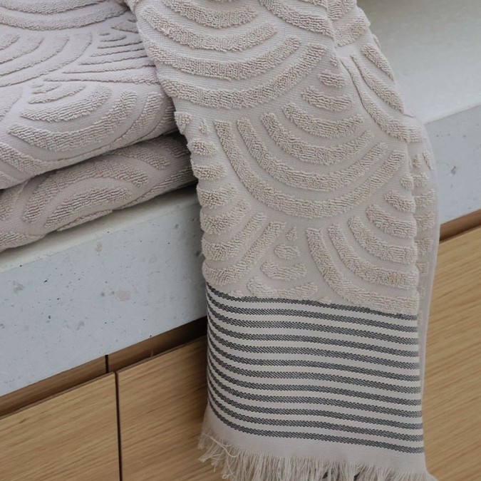 Beige terry towel with black striped weave