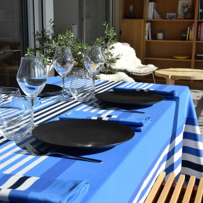 Blue and white striped stain-resistant tablecloth