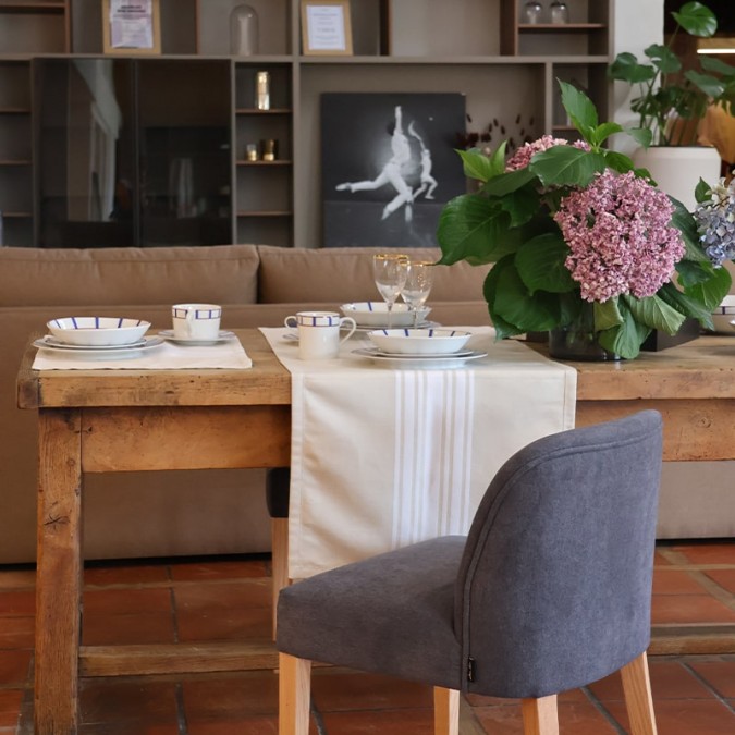 Dark grey table chair in a sleek, trendy design