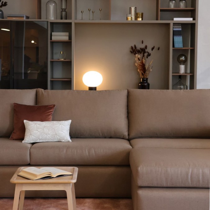 Brown corner sofa with comfortable armrests and backrest