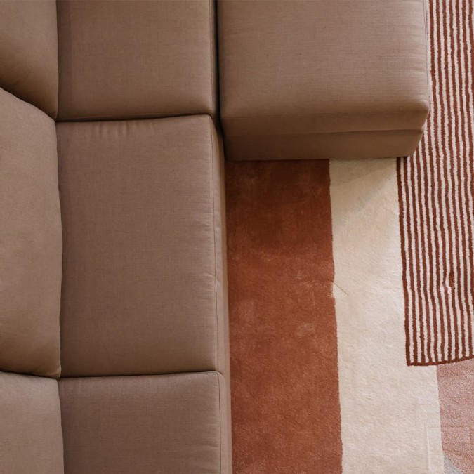 Comfortable modular brown fabric corner sofa with contemporary armrests