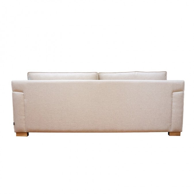 Luxury beige sofa in a pure, timeless style with armrests