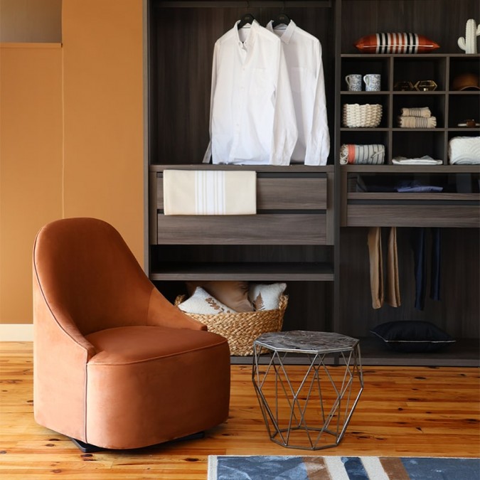 Brown terra cotta swivel armchair in a trendy contemporary design