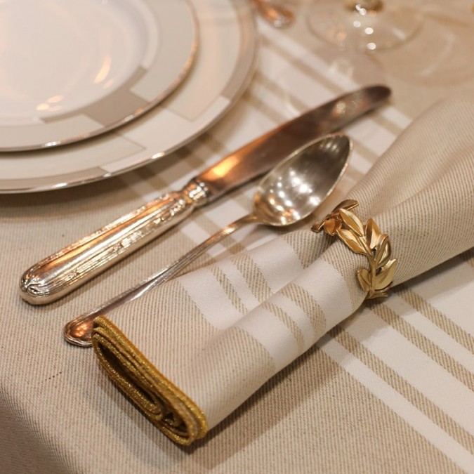 elegant, top-of-the-range beige, white and gold striped napkin