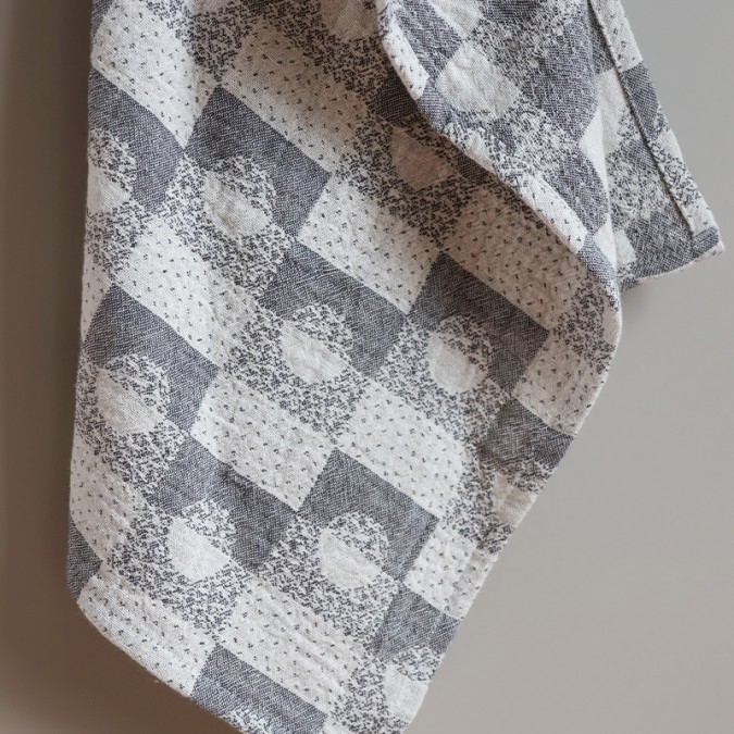 Essuie-mains réalisé en tissage Jacquard de couleur gris