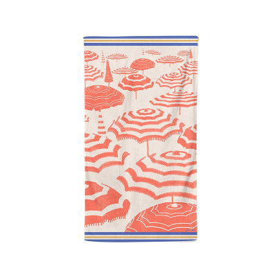 Cotton beach towel with red and blue parasol design