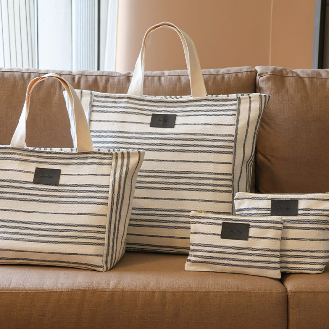 Bagagerie sac beige à rayures noires en tissage Jacquard