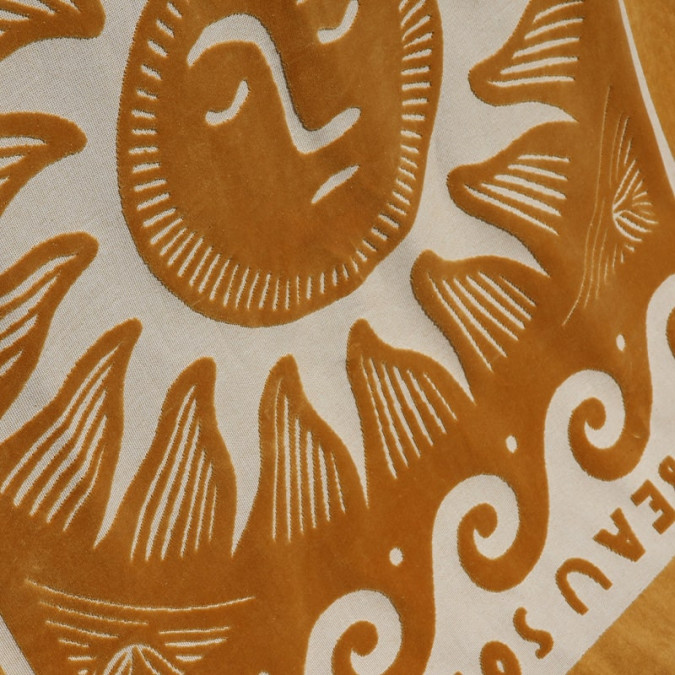 Bohemian style beach towel with brown cotton sun motif