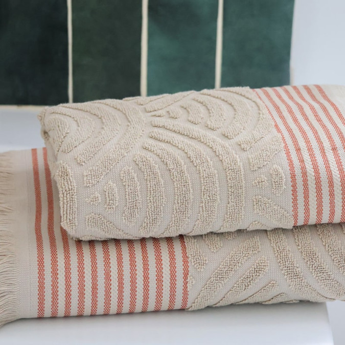 100% cotton bath linen with art deco pattern in terracotta and beige