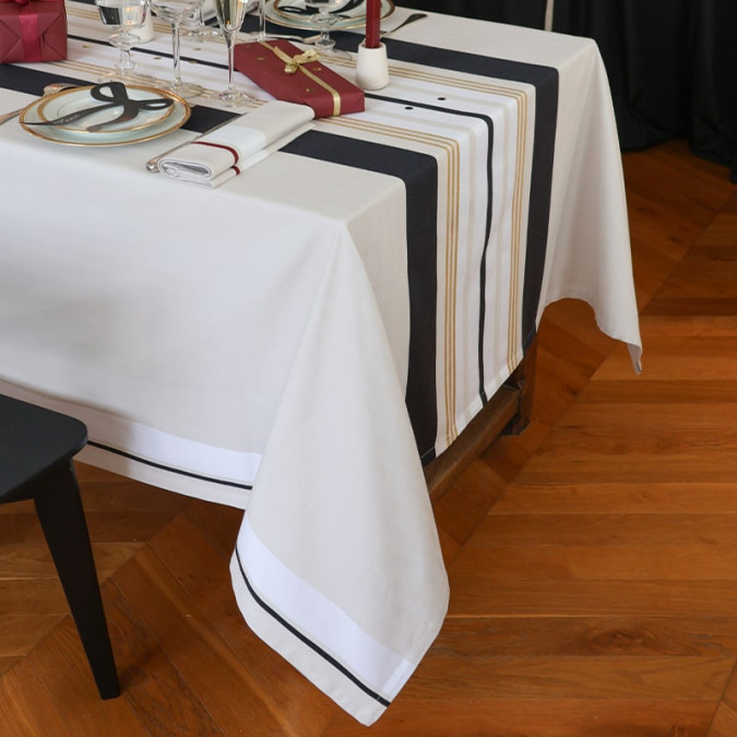 Black, white and gold striped tablecloth for a chic and elegant festive table
