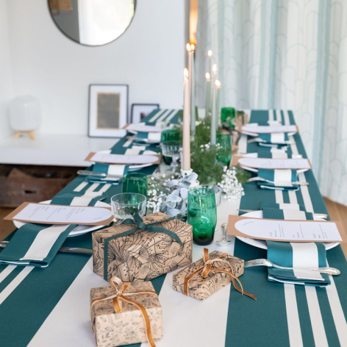 Striped tablecloth for elegant Christmas table decoration in green and white