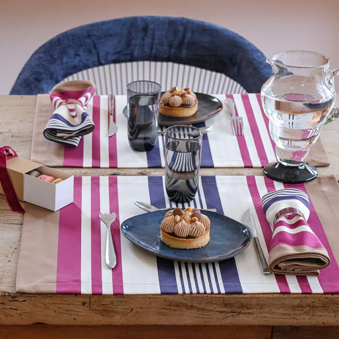 Biarritz Leather Placemat in plum and chestnut brown cotton