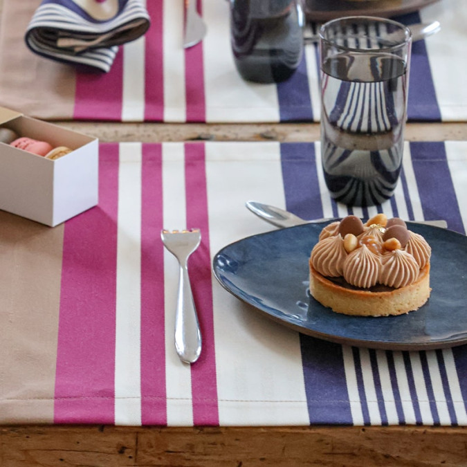 Biarritz Leather Placemat in plum and chestnut brown cotton