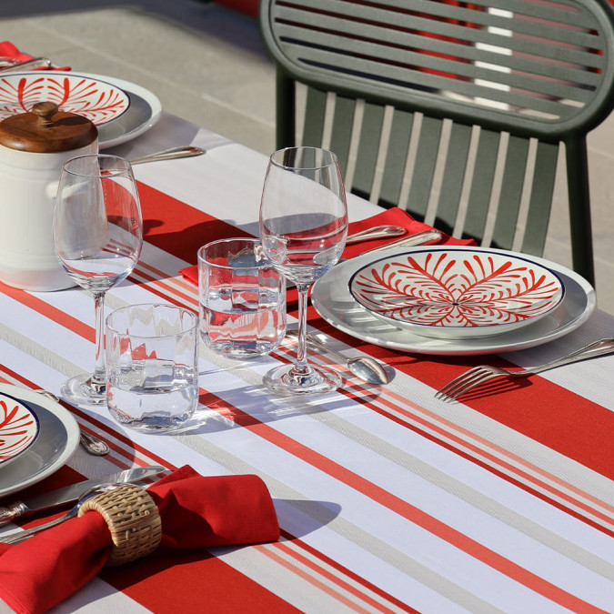 cotton tablecloth with stripes in shades of deep reds, pink beige and white
